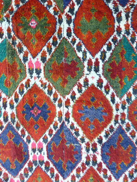 Uzbek Julkhyr with ikat design, four vertical lengths joined. 345 x 140 cm. First half 20th Century.                