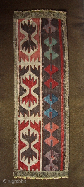 An early Konya kilim fragment  27 x 83cm, 10.75 x 32.5" with an added metal brocade border.               