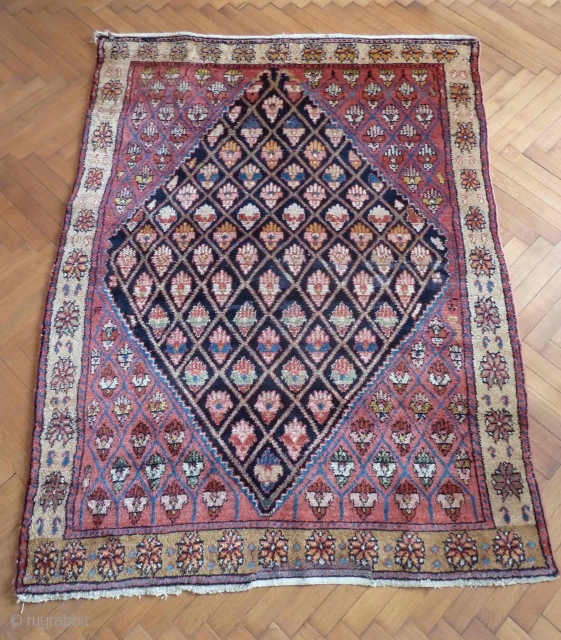 A thick gabbeh/yatak type rug, possibly Kurdish from North West Persia. 185 x 136 cm. Luminous natural colours and long-staple glossy wool on a cotton foundation. There is an old repair to  ...