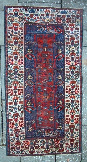 A North Persian rug, possibly Luri, with Ottoman carnation and tulip design. There are one or two related examples in the literature.           