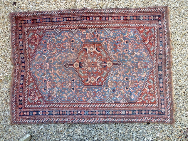 From an English estate, a late nineteenth century Qashqai or Khamseh rug, in generally good condition but in need of a wash. Friendly price.         