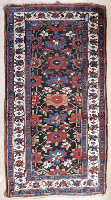 Fabulous 19th Century Sauj Bulagh, 250 x 130cm, 8'2" x 4'3". 10 beautiful colours including aubergine, buff pink and teal and pistachio green. Best Kurdish wool - the charcoal corroded and partially  ...