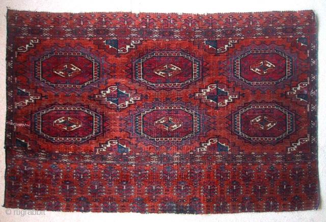 An extremely fine mid-19th century Tekke juval with glowing insect reds and silk highlights. Cloth-like handle and in original condition, save for a stitched cut to the lower left side.   