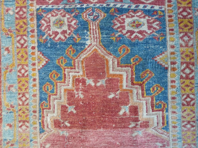 A beaten and faded Anatolian prayer rug, but still has plenty of charm. Late 19th Century, 195 x 122 cm. Friendly price.           