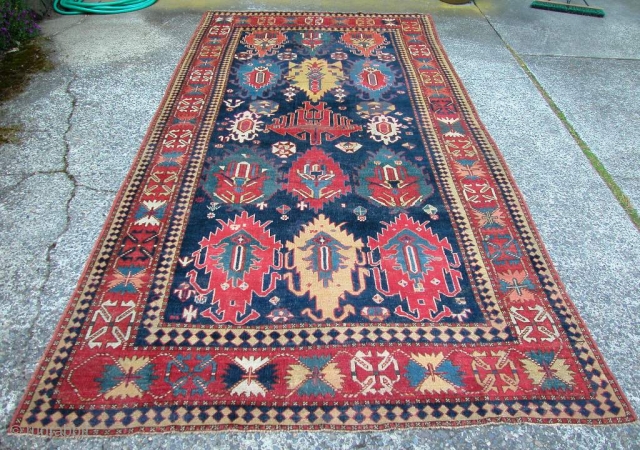 Very rare Central Asian carpet. Circa 1800. Great color and design. 
6'2" x 12'8". Contact us for more details and photos.            