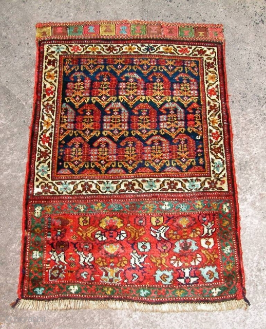 Very beautiful NW Persian Kurdish Bagface, 19th century. Excellent condition, full pile.
2' 0" x 2' 10".                 
