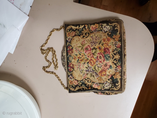 This lovely, well kept, antique, hand-made purse is the ultimate fashion accessory. Made in France circa 1900, the piece is still in near perfect condition. There is a tiny spot on the  ...