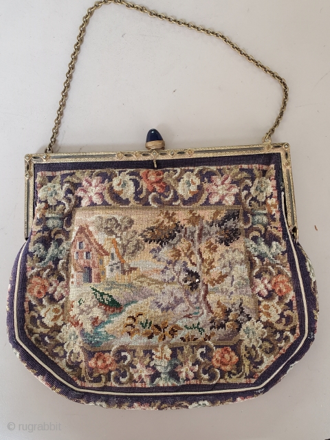 This beautiful Handwoven French makeup Purse still comes with its original mirror; made circa 1900. With its deep purple base color and glamorous fake gem clasp on top this purse is truly  ...