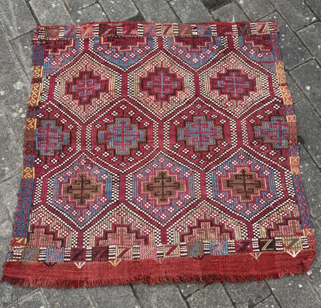 Beautifully woven Zili Chuval front from Mersin, South Anatolia, Türkiye. This piece is around 100 years old and measures approximately 100cm x 80cm. Features bold geometric motifs and vibrant natural dyes in  ...