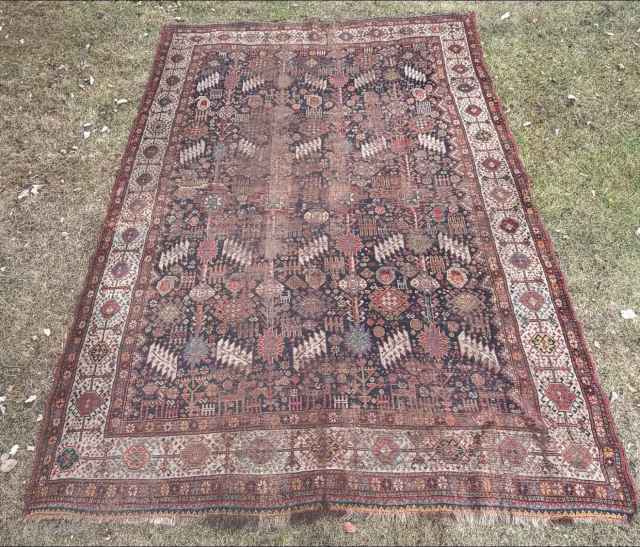 Early Qashqai Shekarlu rug. 271x191cm. In worn condition. Jakezacharybrown@outlook.com
