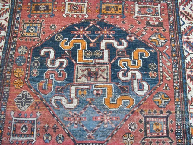 Chondzoresk rugs with this motive have been attributed to Kazak under the name of "Cloudband Kazak" the motive may derive from caucasian dragon carpet
it is probably the second most published karabagh motif.it  ...