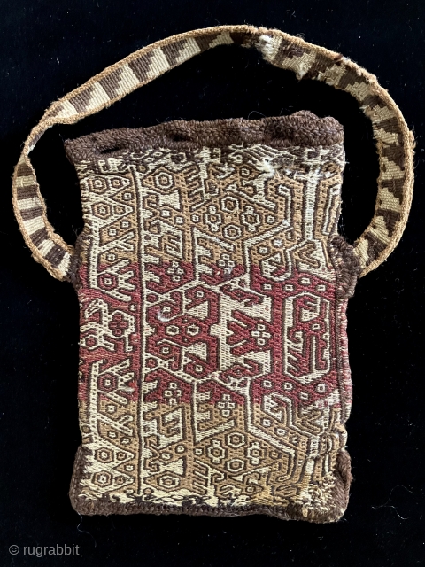 Very interesting Pre-Columbian coca bag with fantastic creatures. This bag has a uniquely complex composition of interlocking imagery on each side.   Both positive and negative spaces are readable and can  ...