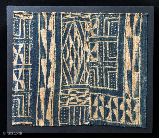 Indigo Blues.  Bamileke Ndop cloth fragment, Africa, Cameroon - 20th century.  This is a nice little resist dyed Ndop cloth fragment has charm.  It is mounted for display.   ...