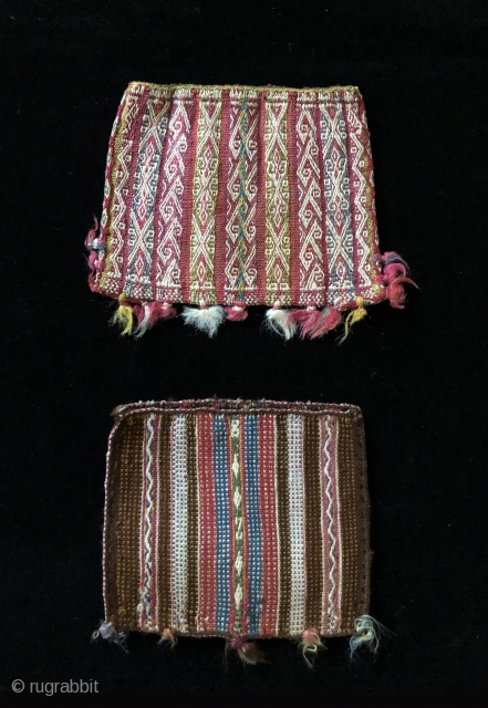 Two Aymara warp-faced woven coca bags from the Lake Titicaca region.  Both bags are in super condition and are quite unusual design-wise.  They are on the smaller of coca bags,  ...