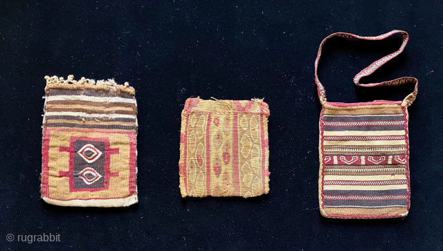 Three small Incan bags.   Rare little group. Largest is 4.25 x 5.25 inches.  The smallest (4.24" x 4") bag features peanut or bean depictions and is tapestry on both  ...