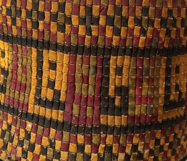 This remarkable textile construction boggles the mind when one thinks about what it took to create such an object. There are nearly 5,000 individual rectangles of silk cloth that were cut on  ...