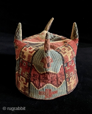 Exceptional and rare Pre-Columbian four cornered hat. Tiwanaku Culture, Bolivia, Chile or Peru. a.d. 600 – a.d. 900. This hat was created in a tight looping structure using fine alpaca yarns. This  ...