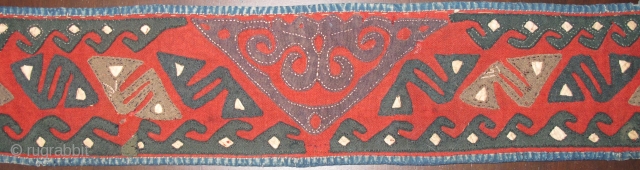 Central Asian Applique Band, red felt-like textile attached to a an old Russian trade cloth attached with indigo dyed cotton binding. Either a belt or perhaps a collar from a garment. Certainly  ...