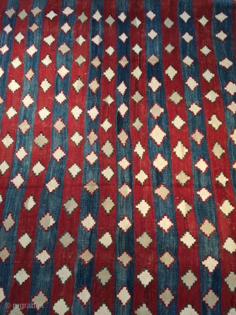 South Central Anatolian Kilim.  Unusual overall design of repeating stepped diamond forms. All dyes natural. Scattered good quality reweaving - mostly along outer edges - completes the picture.  This is  ...