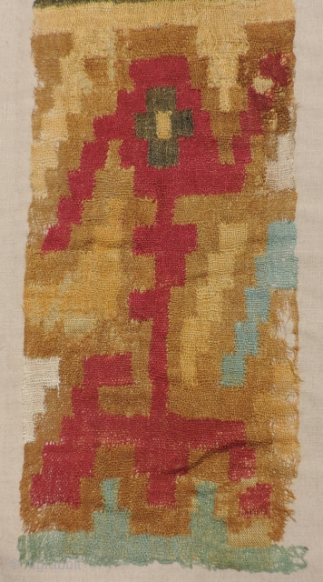 Very fine and delicate pre-Columbian textile in a gauze-like weave with discontinuous warp and weft.  A.D. 200 - 800. The design is likely an abstract zoomorphic representation - possibly a bird-like  ...