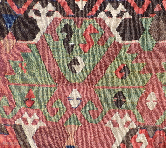 Early Anatolian Kilim Fragment.  First quarter of 19th century or before.  Size 128 x 41 inches.  Nice old piece with good color, a sturdy handle and early imagery.   ...