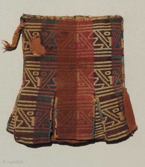 Pre-Columbian Coca Bag.  Before A.D. 1000.  Seven pockets.  Mounted.                     