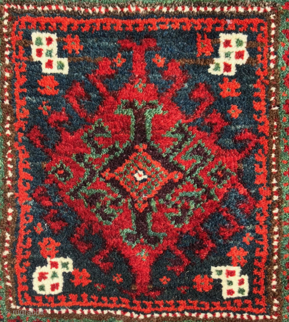 Mint condition, small,  double-sided Baluch bag.  Full pile on both faces of the bag. All dyes natural.  Brilliant reds and greens.  Size: 14 x 14 inches without tassels.  ...