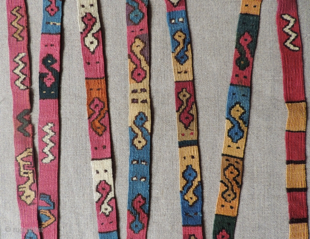 Pre-Columbian Tapestry Strip. Made as either a belt or head wrap.  Nasca Culture, A.D. 200 - 600.  Amazing colors and condition.  Escher-like interlocked  design. This is a very  ...