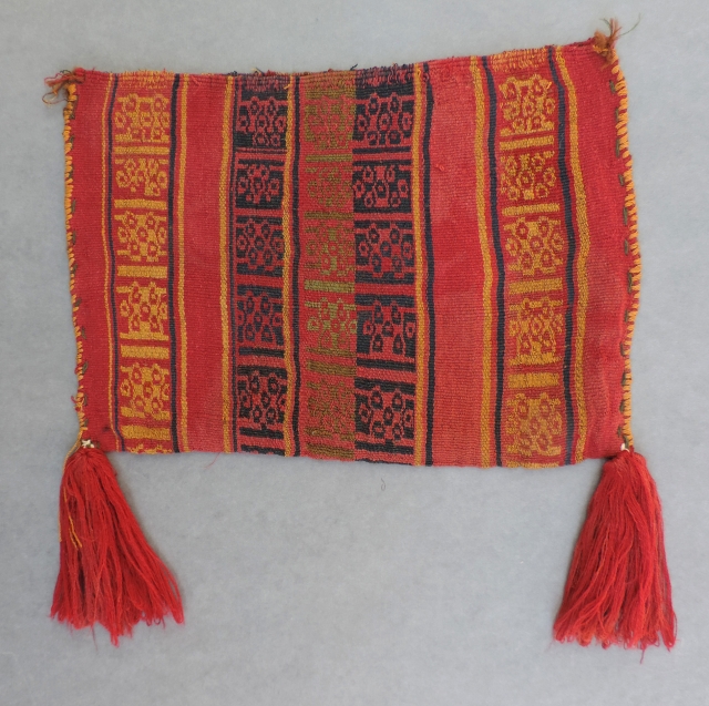 Late Horizon coca bag, Peru, A.D. 1200 - 1400.  Very colorful and supple warp-faced bag in great condition. 
             