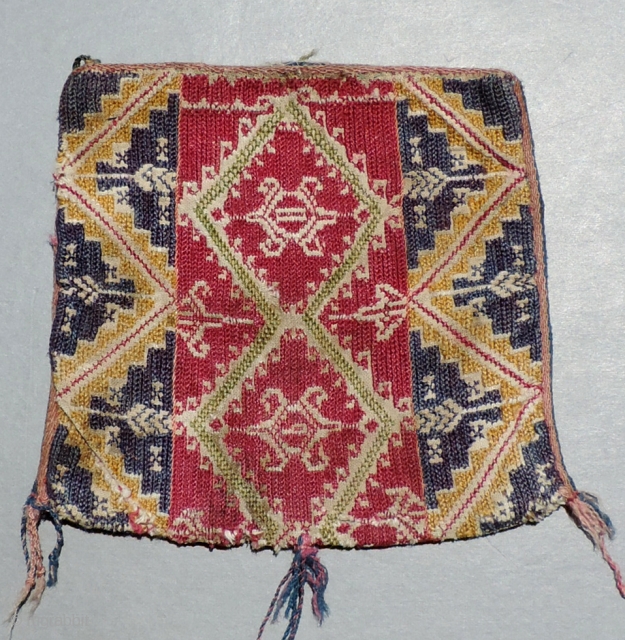 Very unsuual silk embroidered Colonial period coca bag from Bolivia.  18th century or earlier.  The use of silk embroidery signifies that this was a special bag.  The indigenous Aymara  ...