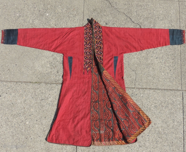 19th century Turkmen coat.  Natural dyed silk embroidery on silk ground with various block print and other fabric lining cloths.  Coat has full sleeves with cuffs not vestigial sleeves. 67  ...