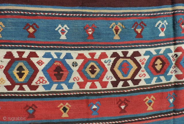 Azerbaijan Kilim. This is a 19th century weaving that has an unusual collection of designs and a good variety of clear, pleasing, natural dyed colors. It is in very good condition and  ...