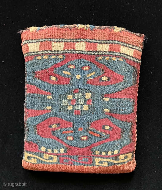 Small two-sided tapestry bag from the Nasca/Wari period.  A.D. 400 – 700.  The iconography is that of a double-headed anthropomorphic or zoomorphic being with arms and/or legs akimbo.  Double–headed  ...