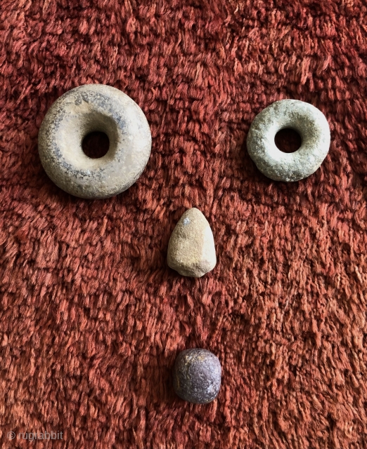 Ancient Andean stone implements.  A.D. 500- 1400's.  The stone discs (Andean Bagels) were used as mace heads or hammer stones when coupled with a wooden handle inserted through the center.  ...