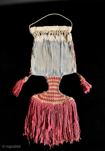 Interesting minimal Incan period bag with separately woven pendant fringe. A.D. 1470 - A.D. 1532. Native repair made in ancient times. Blue cotton bag with alpaca fiber pendant, tassels and side ...