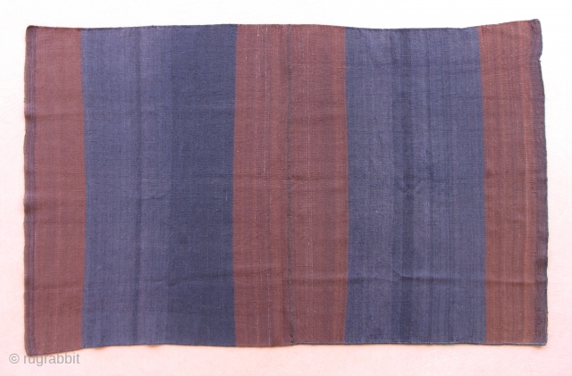 Aymara Mantle (Nañaca). 19th/20th century.  This minimalist warp faced weaving is from the far Southern Altiplano of Bolivia. The aesthetic is ancient and only survived in a very remote, high altitude  ...