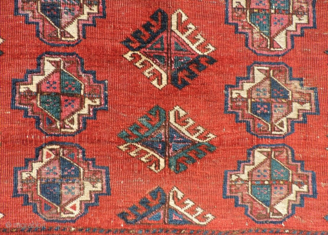  This small Middle Amu Daria Turkmen carpet is of unknown tribal origin, but has the look of a Salor Turkmen weaving. The spacing of the guls is generous and lends a  ...