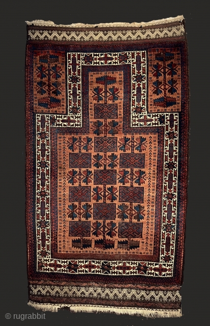 19th century Baluch prayer rug with a very unusual dyed camel field.  The "apricot" colored camel field is quite attractive. It must be the result of a light madder dye bath  ...