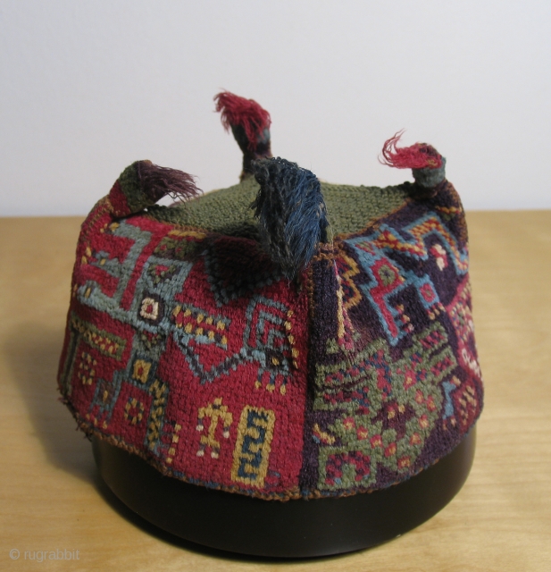 Wari  "four cornered" hats have always been and still remain among the most prized Pre-Columbian Andean textile objects. Their soft lustrous pile and brilliant colors are remarkable. These hats are well  ...