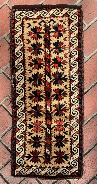 Unusual small Baluch Balisth.  12 x 30 inches. All original. Opens on one side - not the end as is usual. Full pile. All dyes natural. A unique little piece with  ...