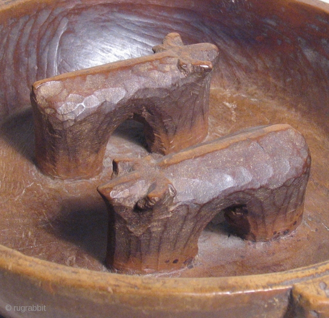 Libation Vessel, 19th century, Bolivia.  Vessels such as this were used in ritual circumstances to make offerings to the spirits.  The two simply carved bulls are symbolic of power and  ...