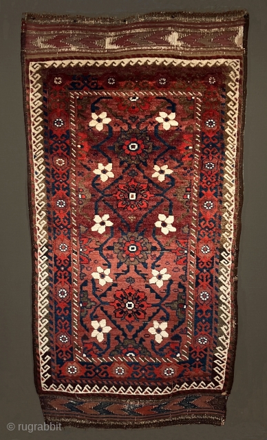 19th century Baluch with Mina Khani design.  This is a fabulous rug of the group sometimes referred to as the” plum group”.  It is one of a very few old  ...
