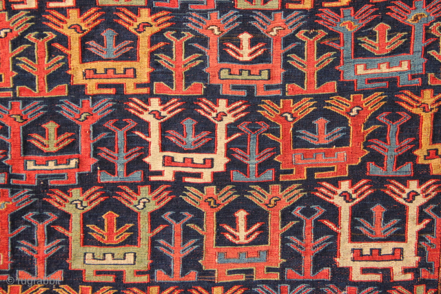 Richly coloured early Shah Savan soumac bagface, mounted, with incredible fine quality. Depicting a multi-coloured flock of double headed birds. The jewel of your collection.
Mount size: 2'4" x 2'0" / 72 x ...