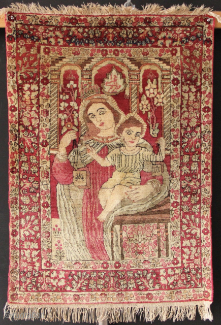 Lavar Kirman pictoral mat, late 19th century 1'11" x 2'9"
Virgin Mary and baby Jesus in perfect condition.                