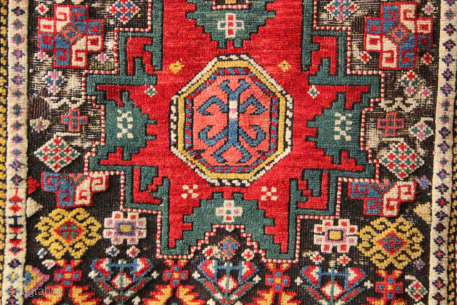 Fantastically colourful and fine old Lesghi Shirvan small rug that has seen better days but still shines. Absolutely gorgeous. Dated or inscribed twice. A good dollop of Mauvine but still an early ...