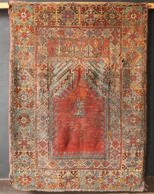 Village Mudjur prayer rug circa 1825, with light red wefts, mid brown wefts and dark brown wefts. All wool.
3'10" x 5'1"            