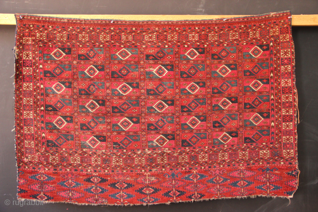 Fine Tekke chuval, late 19th century. Worn and dirty, 122 x 79cm / 4'0" x 2'7" All natural dyes.              