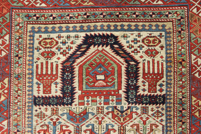 Mid 19th century fine Shirvan prayer rug, with beautiful colours, surface and structure. Cut and shut through the middle and missing about 5 cm/2 inches. 95 x 151cm / 3'1" x 5'1"
However,  ...