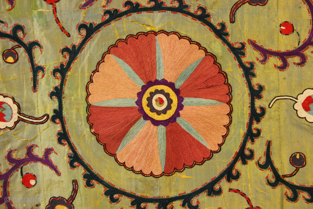 19th century green silk Lakai nim suzani 125 x 161cm / 4'1" x 5'3" in good condition. Some breaks to the silk, to be expected and one hole on the left side ...