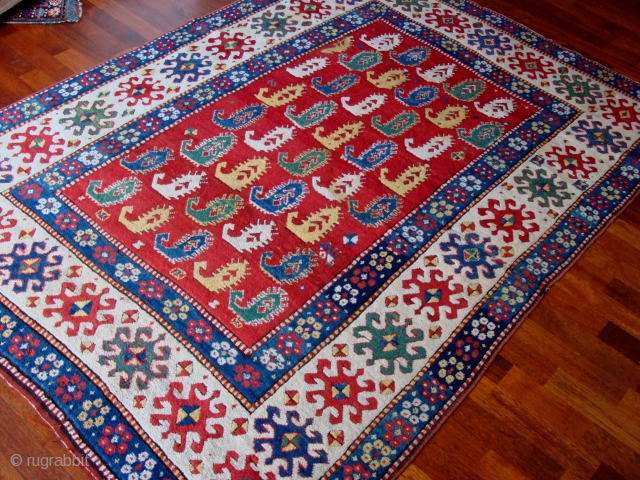 Kazak rug circa 1850, possibly Karachopf area. Some minor condition issues inc small stains, light moth damage and a classic kazak wrinkle, original sides and kilims, no worn areas. Yellow has come  ...